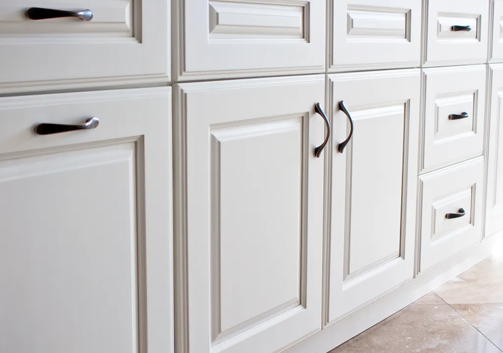 Refinished white kitchen cabinets