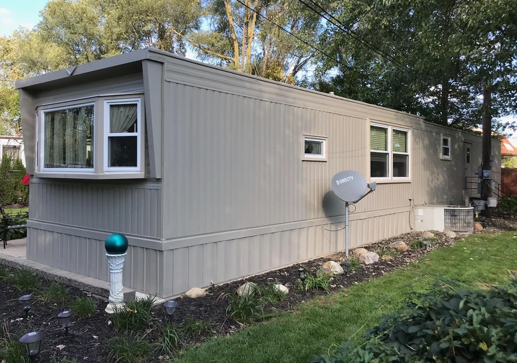 new painted taupe trailer park home