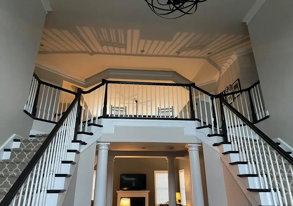 Freshley painted stairs, ceiling and walls by Platinum Painting Plus