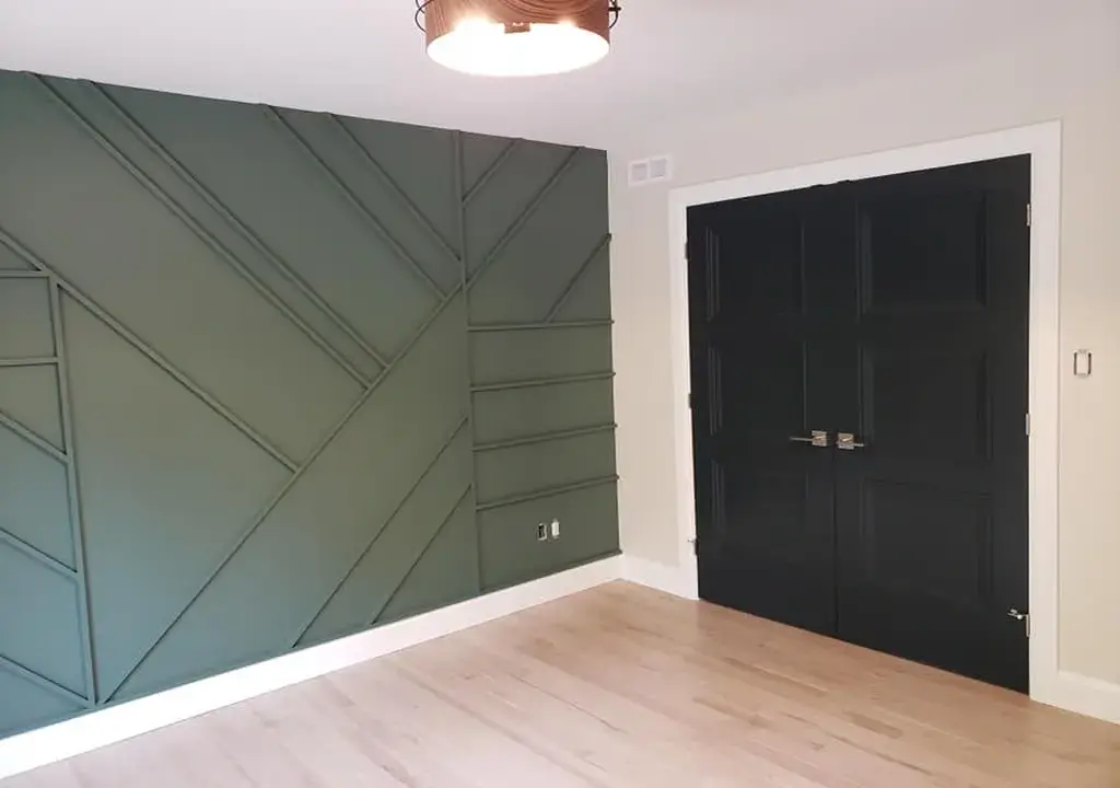 green accent wall and black door interior residential painting