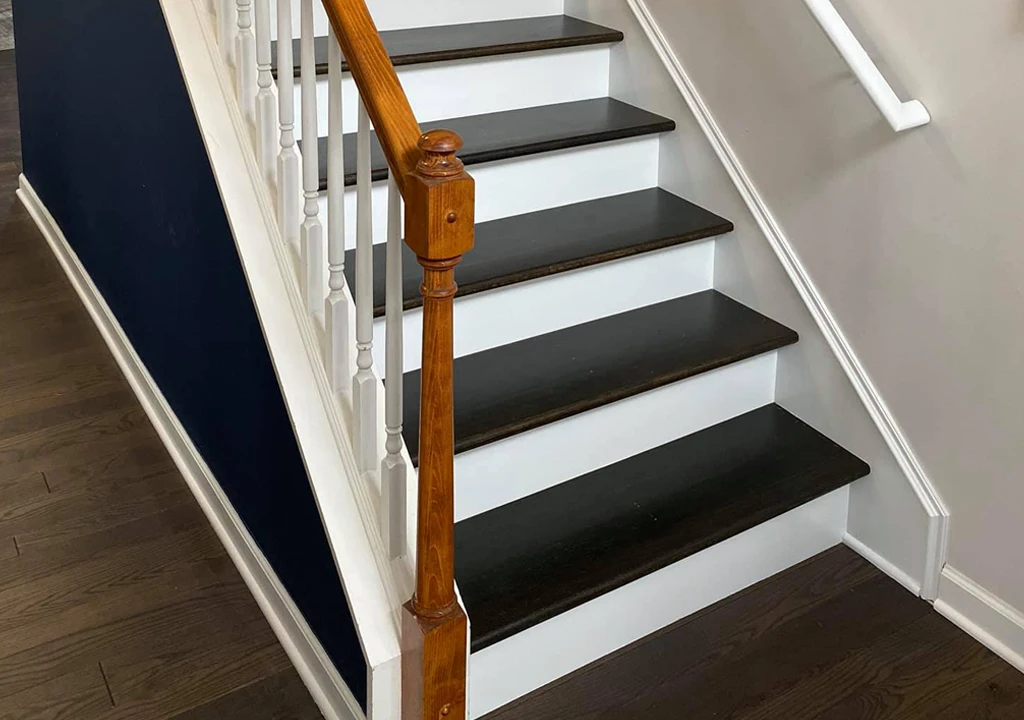 wood steps refinishing and navy blue wall paint